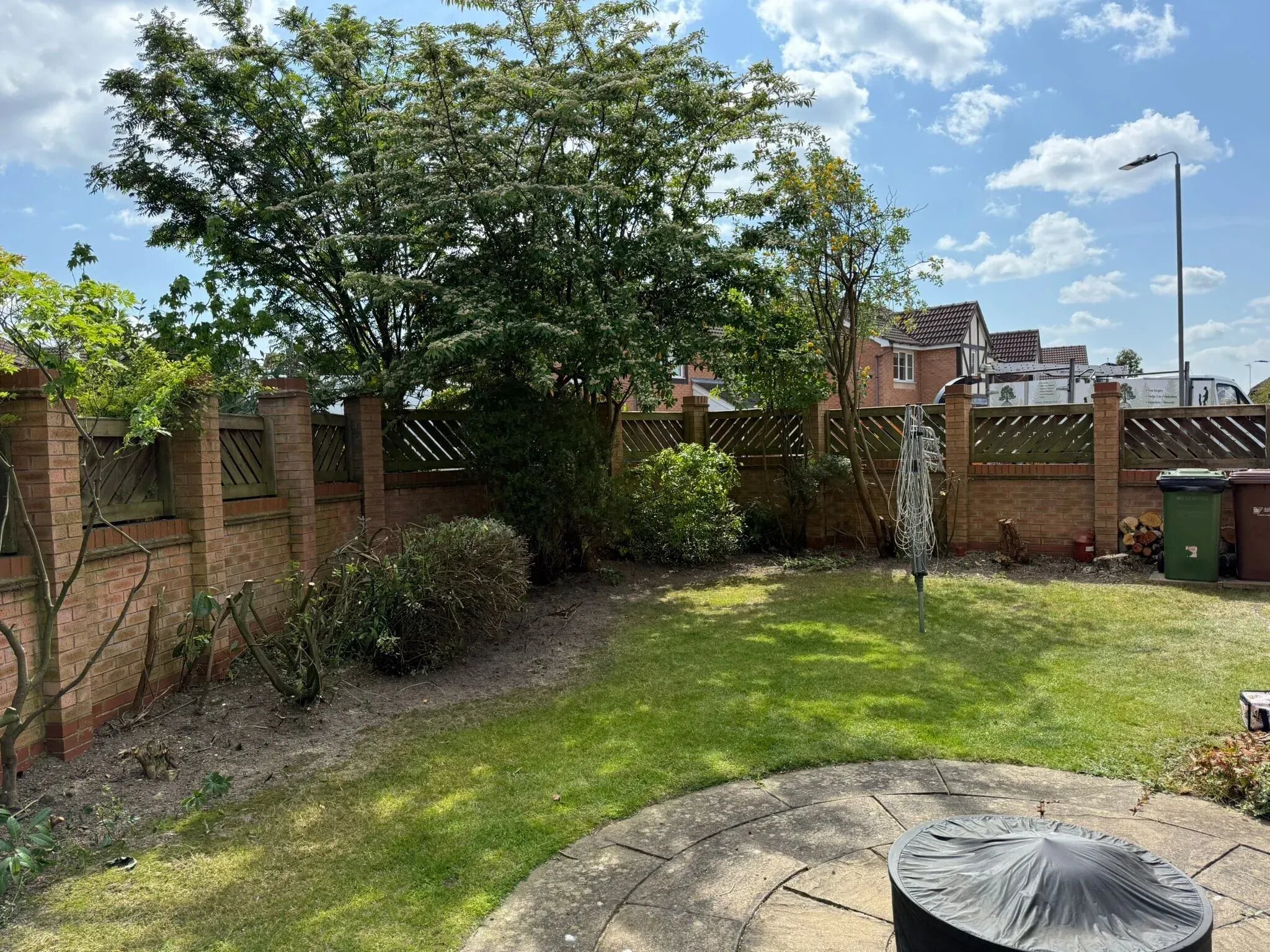 Garden looks tidy after tree surgery done in property in Cookridge, Leeds